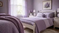 Wide view of a lilac bedroom with white furniture and sheer curtains.
