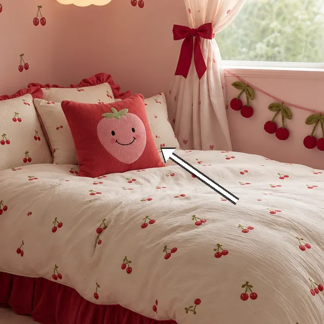 Window with heart-pattern curtains tied with red ribbons