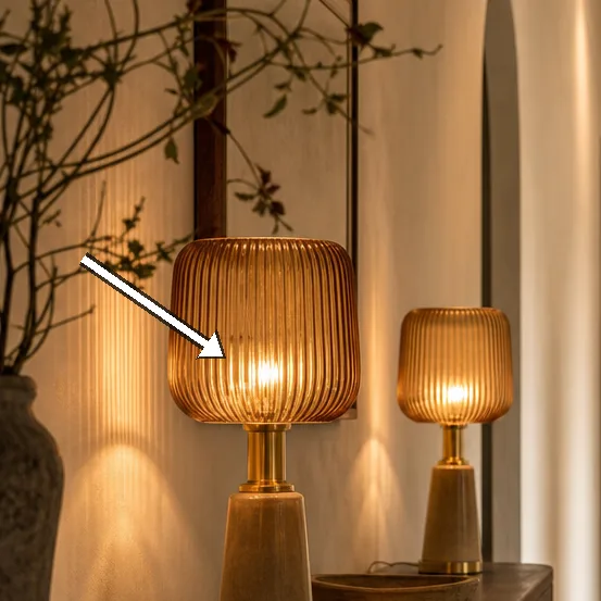 Amber glass lamp shades cast soft honey light on the console.